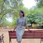 Aartyz Women Straight Skirt With Asymmetric Crop Top