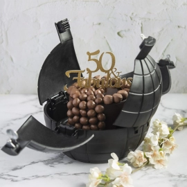 Pinata Bomb Cake used for birthday parties of kids and people.