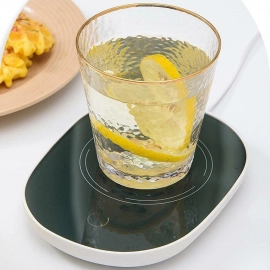 Coffee Mug Warmer For Having Coffee Along With The Warmer That Keeps It Hot